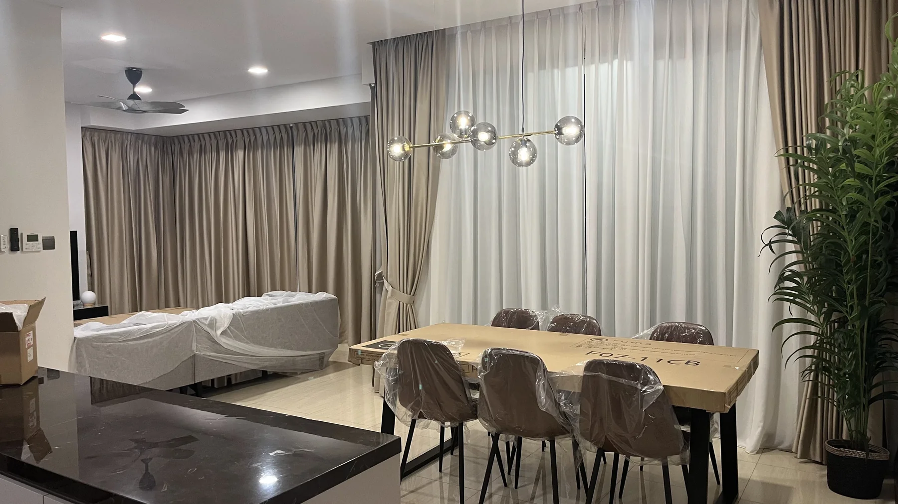 Puteri Cove residence living and dining fit-out before handover