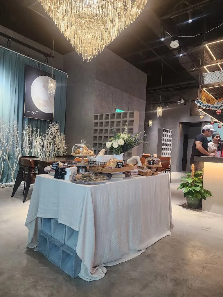 Thera Cafe completed interior with chandelier and dining setup
